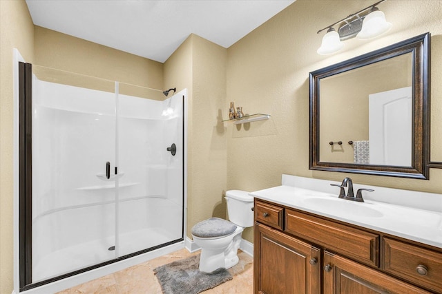 1601 Congressional Way, Champaign, IL 61822 - bathroom featuring a shower stall, toilet, vanity, a textured wall, and baseboards