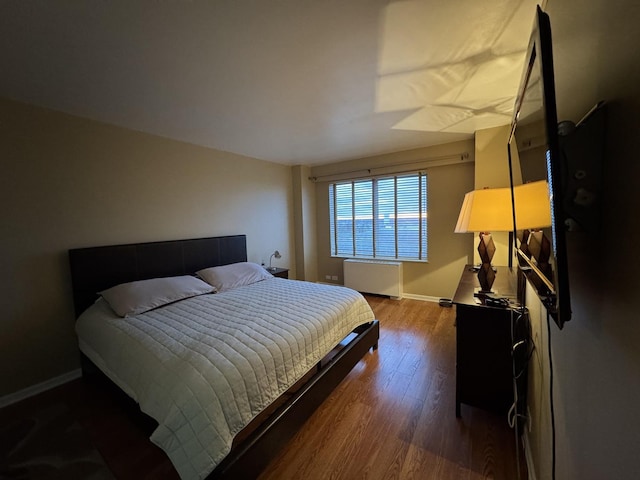 7033 N Kedzie Ave Unit 904, Chicago, IL 60645 - bedroom with wood finished floors and baseboards