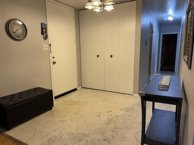 7033 N Kedzie Ave Unit 904, Chicago, IL 60645 - hall with light marble finish floors and baseboards