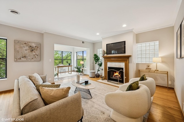 5055 N Sheridan Rd Unit 3N, Chicago, IL 60640 - living room with a high end fireplace, light wood finished floors, ornamental molding, and recessed lighting
