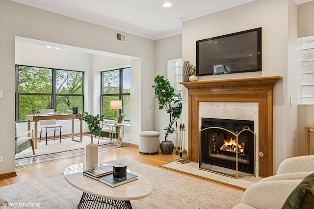 5055 N Sheridan Rd Unit 3N, Chicago, IL 60640 - living room featuring a fireplace, wood finished floors, crown molding, recessed lighting, and a desk