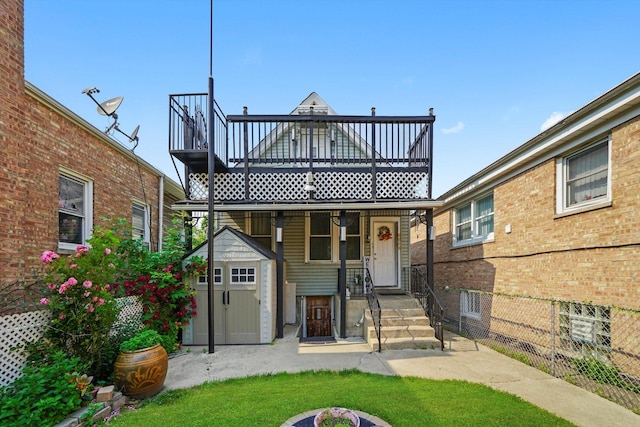 5512 W Wrightwood Ave, Chicago, IL 60639 - back of property with a shed and a lawn