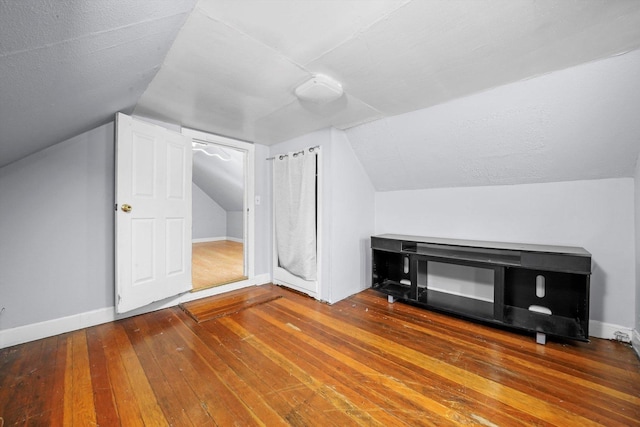 5512 W Wrightwood Ave, Chicago, IL 60639 - additional living space featuring lofted ceiling and hardwood / wood-style floors