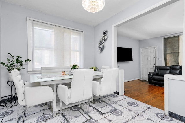 5512 W Wrightwood Ave, Chicago, IL 60639 - dining room with a chandelier and wood finished floors