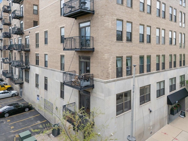 811 S Lytle St Unit 101, Chicago, IL 60607 - view of apartment building / complex with uncovered parking