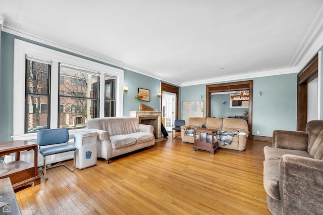 1347 E Hyde Park Blvd, Chicago, IL 60615 - living area with light wood finished floors and ornamental molding