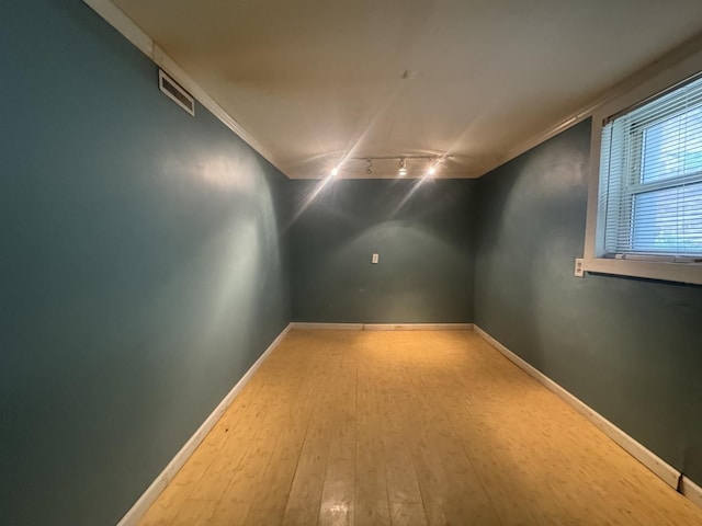 2439 S 57th Ave, Cicero, IL 60804 - additional living space featuring hardwood / wood-style floors and baseboards