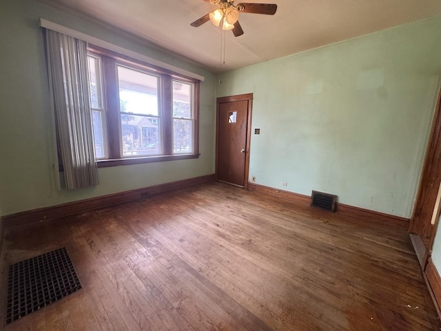 2439 S 57th Ave, Cicero, IL 60804 - empty room with hardwood / wood-style flooring and a ceiling fan
