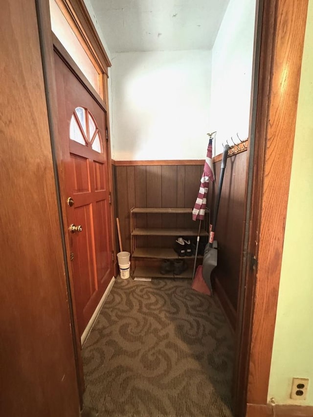 2439 S 57th Ave, Cicero, IL 60804 - entrance foyer with carpet floors, a wainscoted wall, and wooden walls
