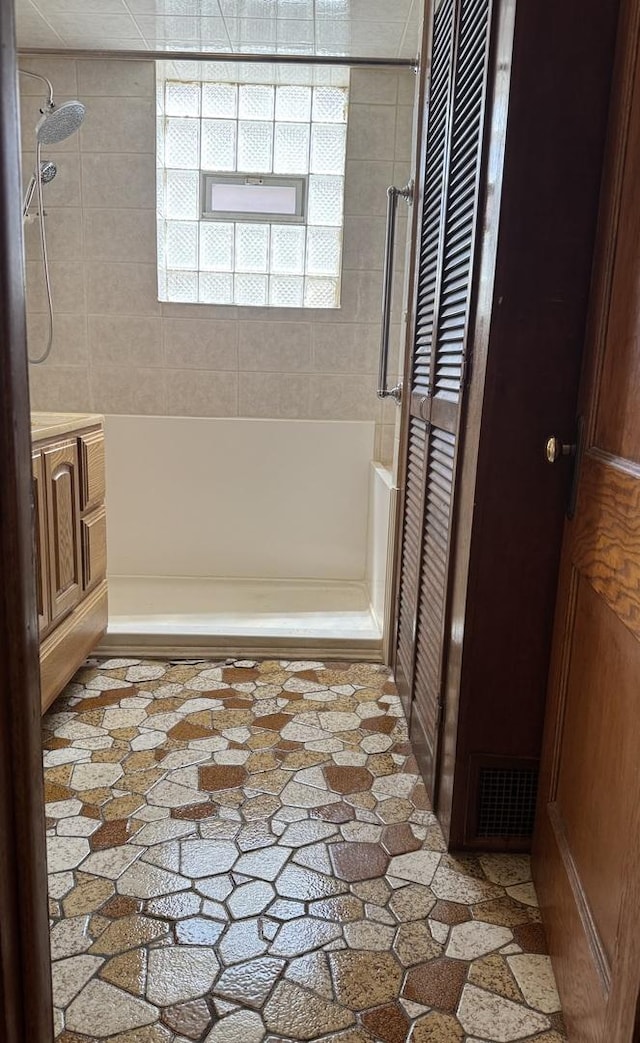 2439 S 57th Ave, Cicero, IL 60804 - full bath with a shower, a bath, and a closet