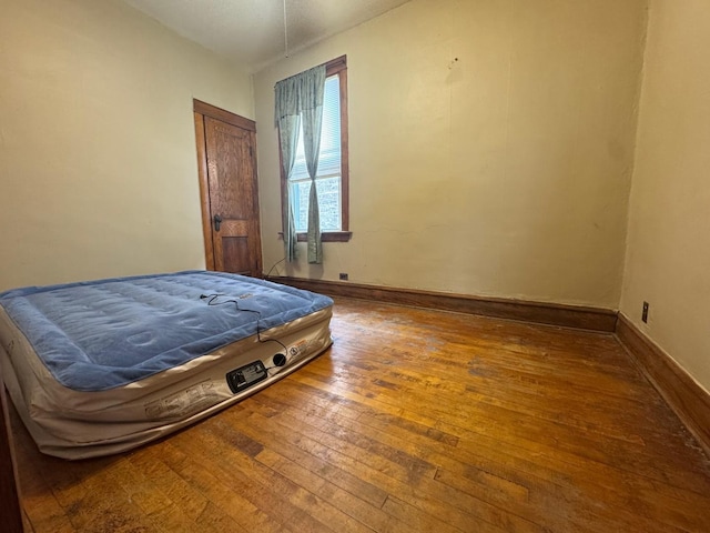 2439 S 57th Ave, Cicero, IL 60804 - bedroom with wood-type flooring and baseboards
