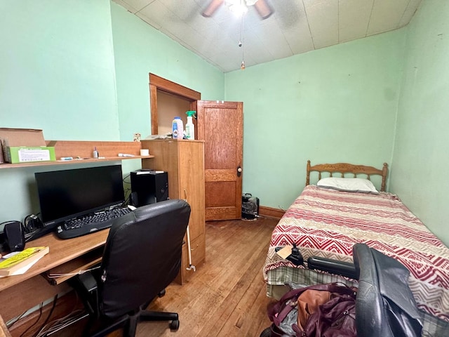 2439 S 57th Ave, Cicero, IL 60804 - bedroom featuring wood-type flooring, an office area, and a ceiling fan
