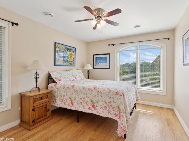 301 Brownstone Dr, Saint Charles, IL 60174 - bedroom with light wood-style floors, baseboards, and ceiling fan