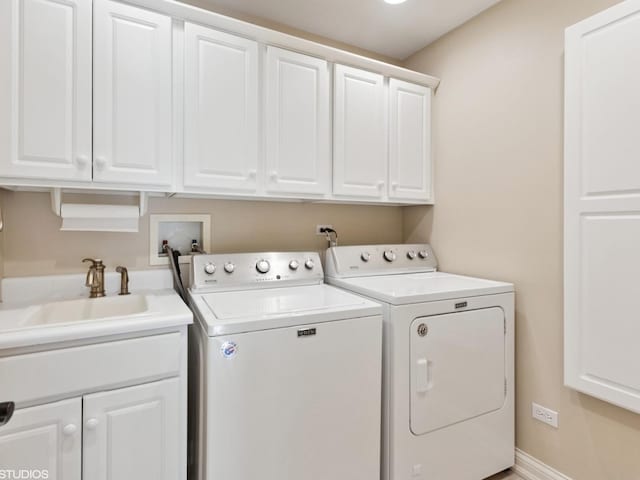 301 Brownstone Dr, Saint Charles, IL 60174 - washroom with cabinet space, washer and clothes dryer, and baseboards