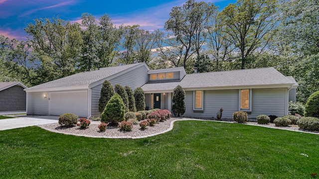 2625 E Vera Ln, Crete, IL 60417 - mid-century inspired home featuring a front lawn, an attached garage, driveway, and roof with shingles