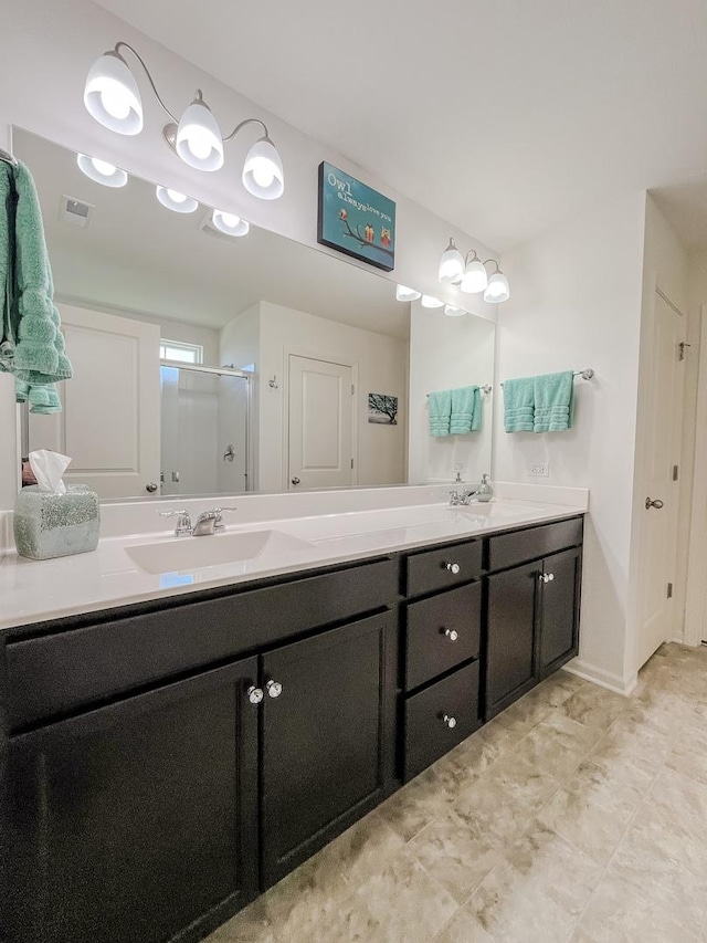 1806 Peyton Ter, Shorewood, IL 60404 - full bath with a stall shower, double vanity, and baseboards