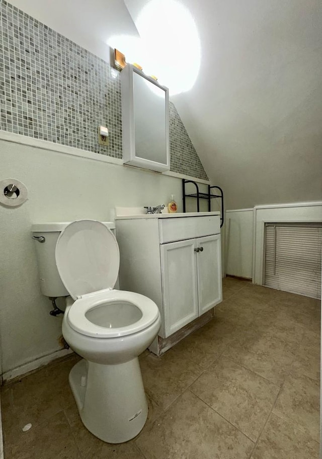 10749 S State St, Chicago, IL 60628 - bathroom with vanity, toilet, and tile patterned flooring
