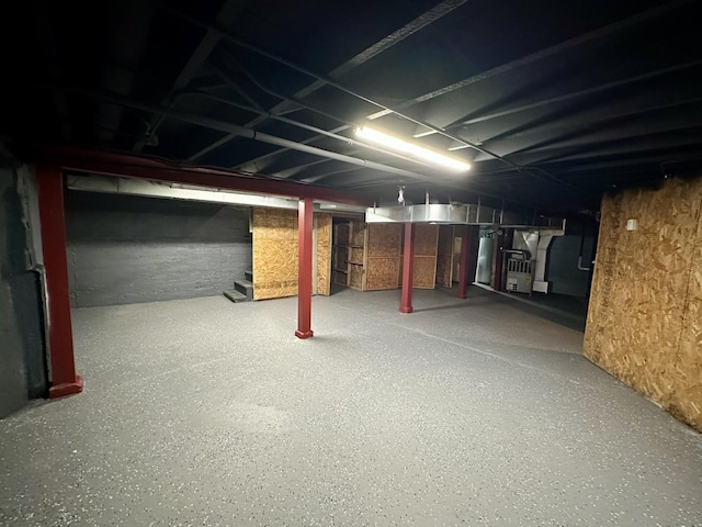 10749 S State St, Chicago, IL 60628 - unfinished below grade area with water heater and stairs