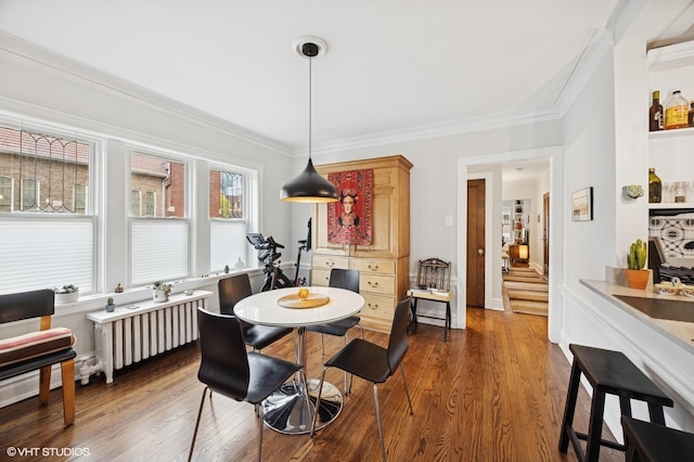 1112 Ontario St Unit 1E, Oak Park, IL 60302 - dining space featuring dark wood-style flooring and ornamental molding