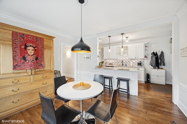 1112 Ontario St Unit 1E, Oak Park, IL 60302 - dining space with dark wood-type flooring and crown molding