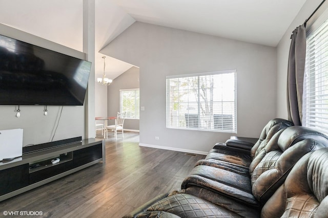 3330 Cameron Dr Unit 17-1, Elgin, IL 60124 - living area featuring lofted ceiling, a chandelier, dark wood-type flooring, and baseboards