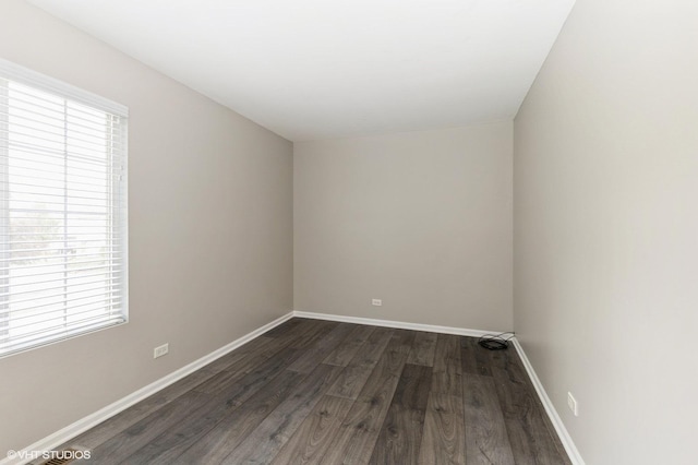 3330 Cameron Dr Unit 17-1, Elgin, IL 60124 - spare room featuring dark wood-style flooring and baseboards