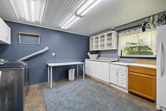 laundry area with cabinet space and washer and clothes dryer