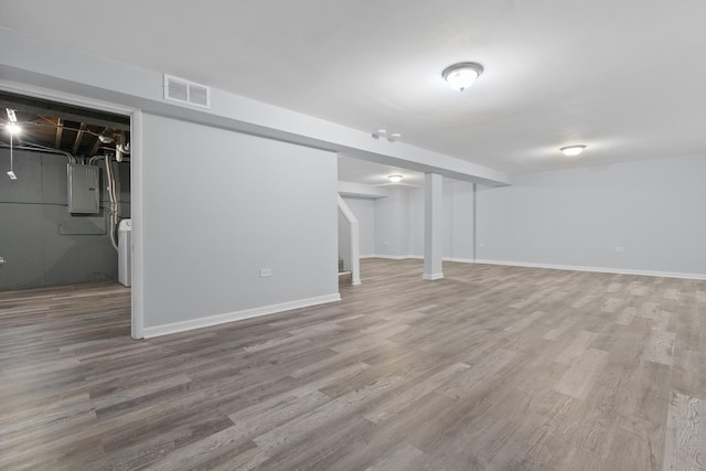 15503 Cherry St, South Holland, IL 60473 - finished below grade area featuring electric panel, wood finished floors, stairs, washer / dryer, and baseboards