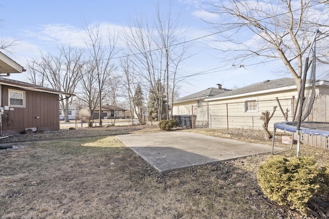 15503 Cherry St, South Holland, IL 60473 - fenced backyard featuring a trampoline and a patio