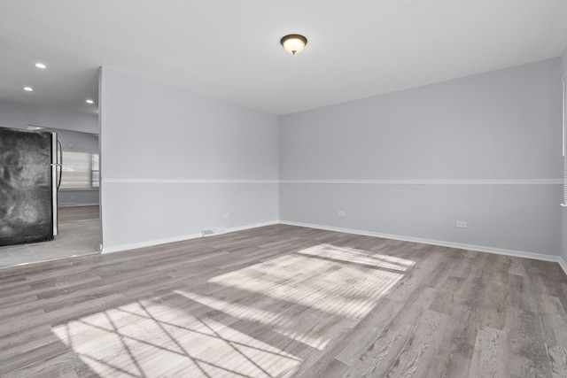 15503 Cherry St, South Holland, IL 60473 - unfurnished room with wood finished floors, baseboards, and recessed lighting