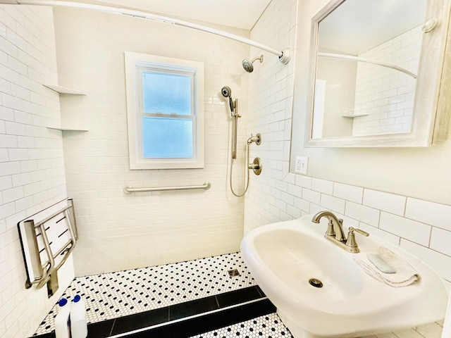 1115 E Wilson St, Streator, IL 61364 - bathroom with tile walls, tiled shower, and a sink