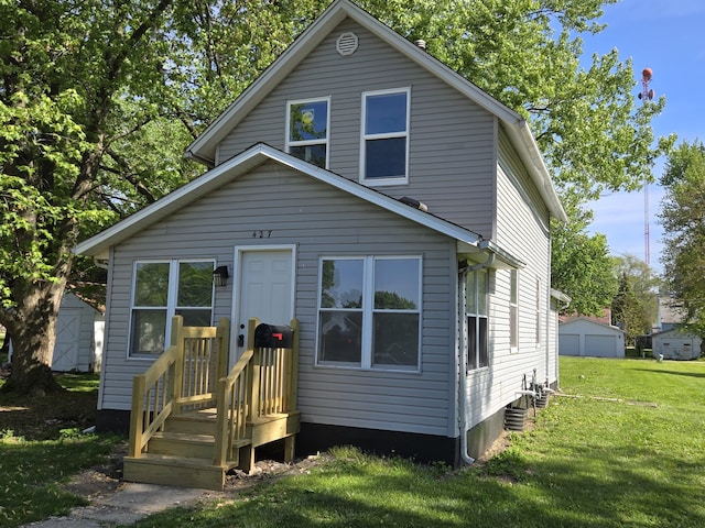view of front of home with a front lawn