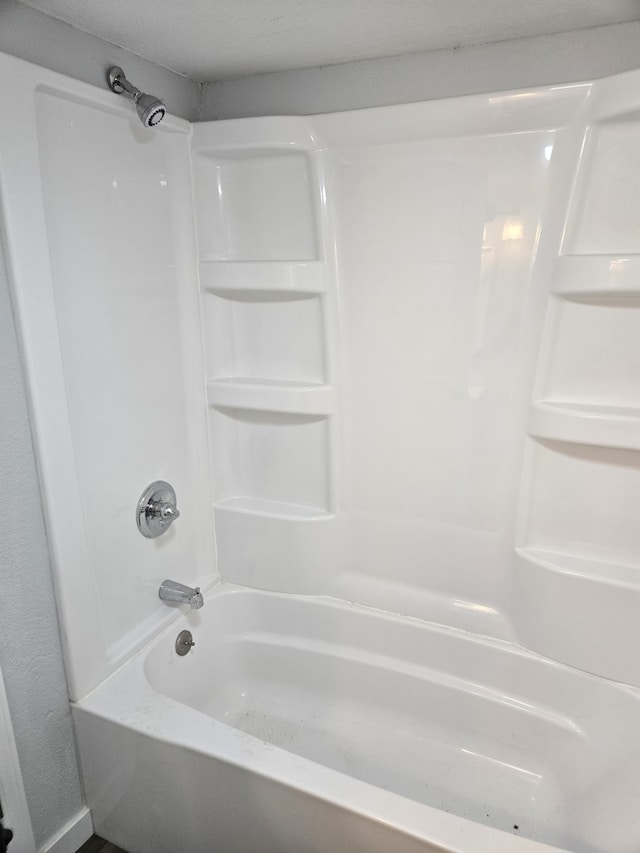 full bathroom with shower / tub combination