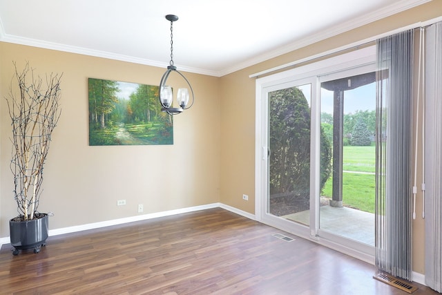 2169 Sunderland Ct Unit 101B, Naperville, IL 60565 - spare room featuring ornamental molding, baseboards, wood finished floors, and a chandelier