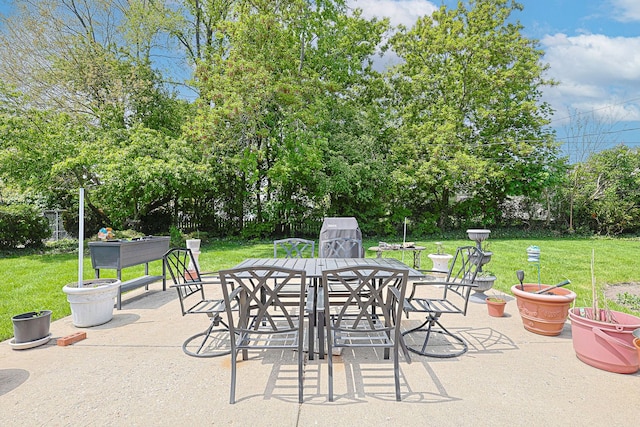 1703 W Robbie Ln, Mount Prospect, IL 60056 - view of patio / terrace with outdoor dining space and view of scattered trees