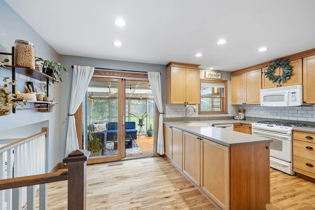 12826 Artesian St, Lemont, IL 60439 - kitchen with white appliances, a sink, tasteful backsplash, light wood finished floors, and recessed lighting