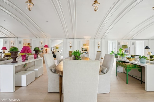 dining space featuring light wood-style flooring