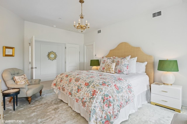 bedroom with a chandelier