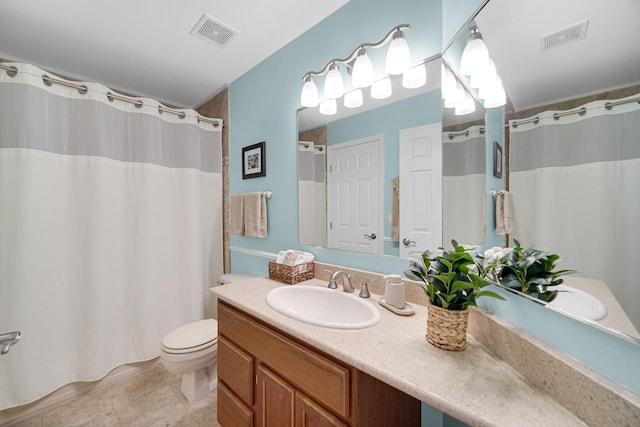 201 Charleston Ct Unit 2, Schaumburg, IL 60193 - full bath with vanity, toilet, tile patterned floors, and a shower with shower curtain