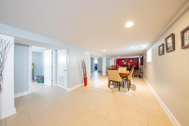 dining area featuring recessed lighting, baseboards, and light tile patterned floors