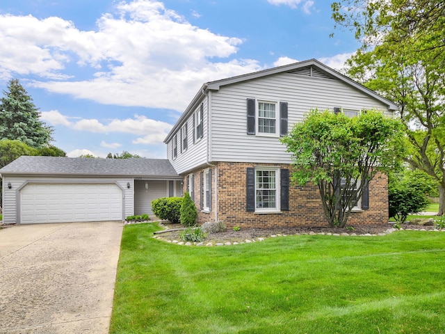 1528 Apache Dr, Naperville, IL 60563 - colonial house with brick siding, concrete driveway, an attached garage, and a front yard