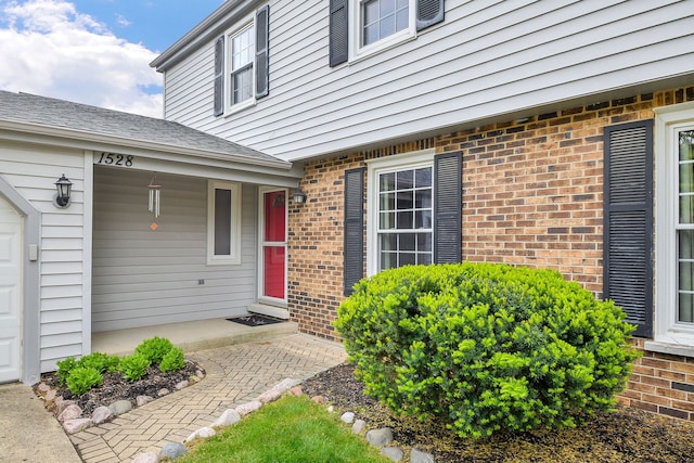 1528 Apache Dr, Naperville, IL 60563 - property entrance with brick siding and a porch