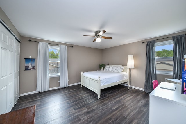 1528 Apache Dr, Naperville, IL 60563 - bedroom featuring multiple windows, dark wood-style floors, a closet, and a ceiling fan