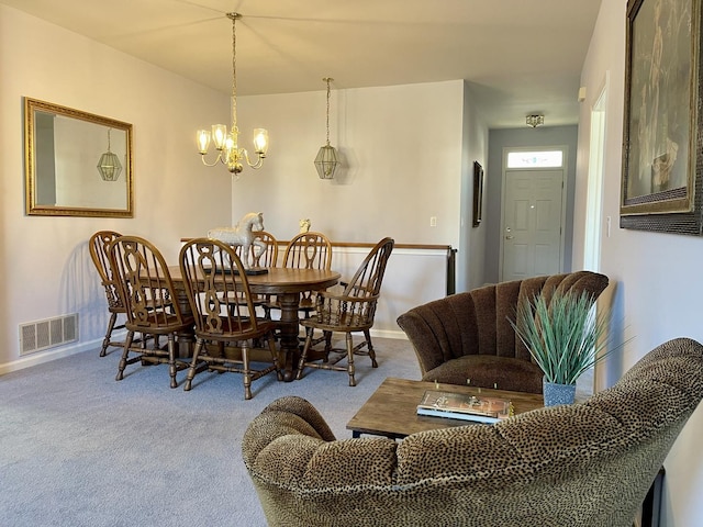 21148 W Cypress Ln, Plainfield, IL 60544 - carpeted dining area featuring baseboards and a chandelier