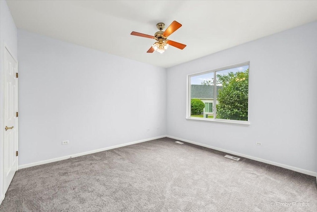 21148 W Cypress Ln, Plainfield, IL 60544 - spare room with carpet, ceiling fan, and baseboards