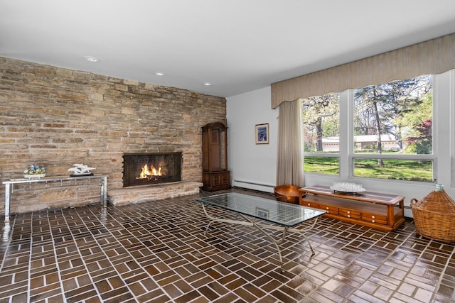 1N341 Indian Knoll Rd, West Chicago, IL 60185 - unfurnished living room with a baseboard heating unit, brick floors, a fireplace, and recessed lighting