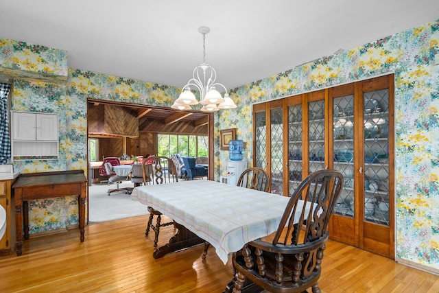 1N341 Indian Knoll Rd, West Chicago, IL 60185 - dining space featuring wallpapered walls, a chandelier, and light wood-style floors