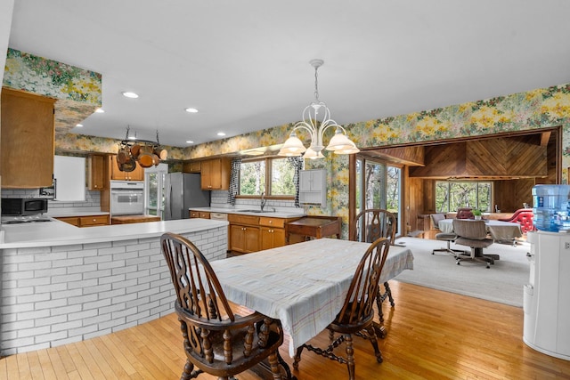 1N341 Indian Knoll Rd, West Chicago, IL 60185 - dining area with wallpapered walls, a chandelier, light wood-style flooring, and recessed lighting
