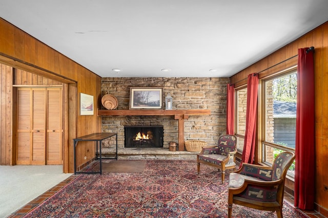 1N341 Indian Knoll Rd, West Chicago, IL 60185 - sitting room with wooden walls, a fireplace, and carpet flooring