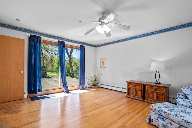 1N341 Indian Knoll Rd, West Chicago, IL 60185 - sitting room featuring baseboard heating, a baseboard radiator, light wood-style flooring, and ceiling fan